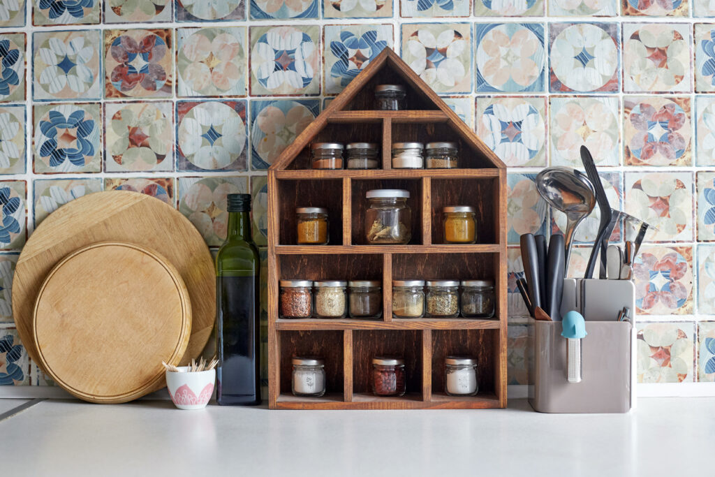 vertical spice rack on a kitchen counter
