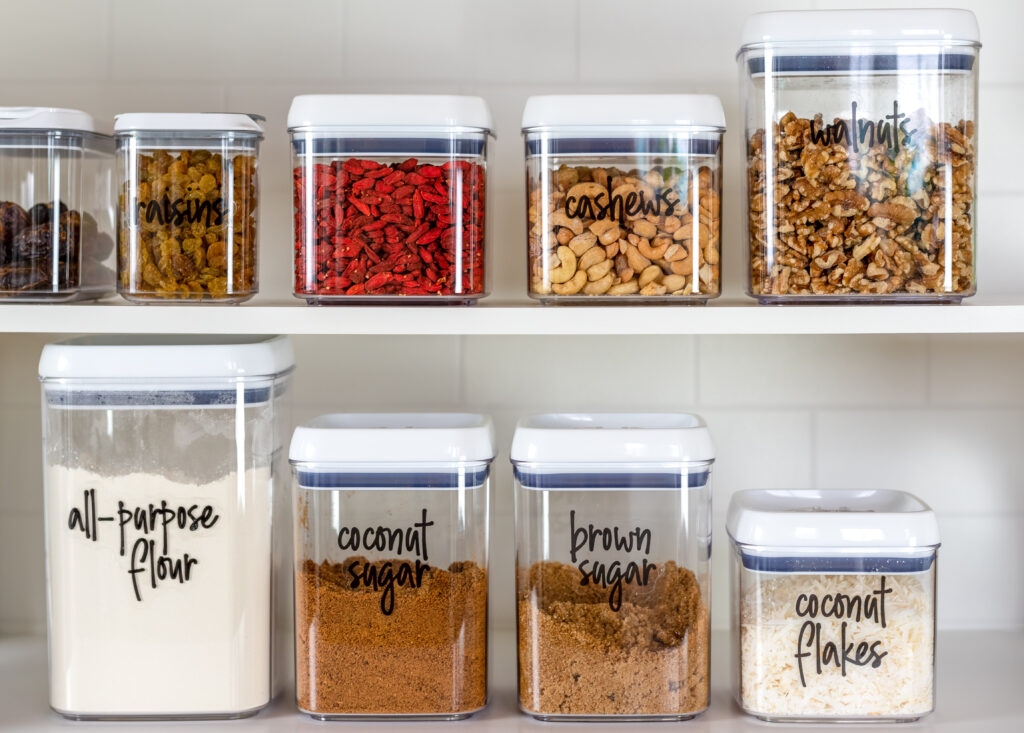 Neatly organized pantry with labeled baking ingredients