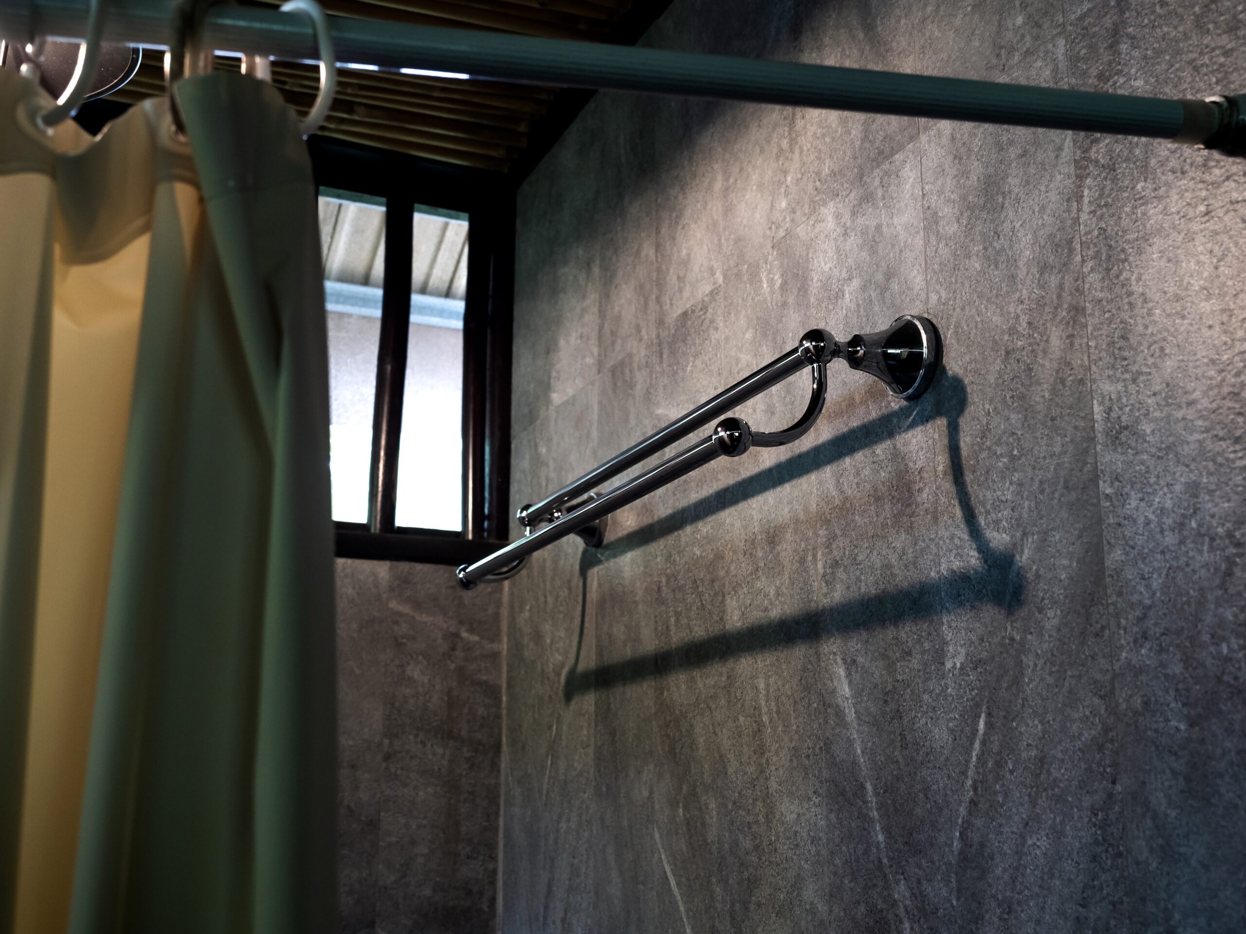 modern bathroom with metallic towel rod