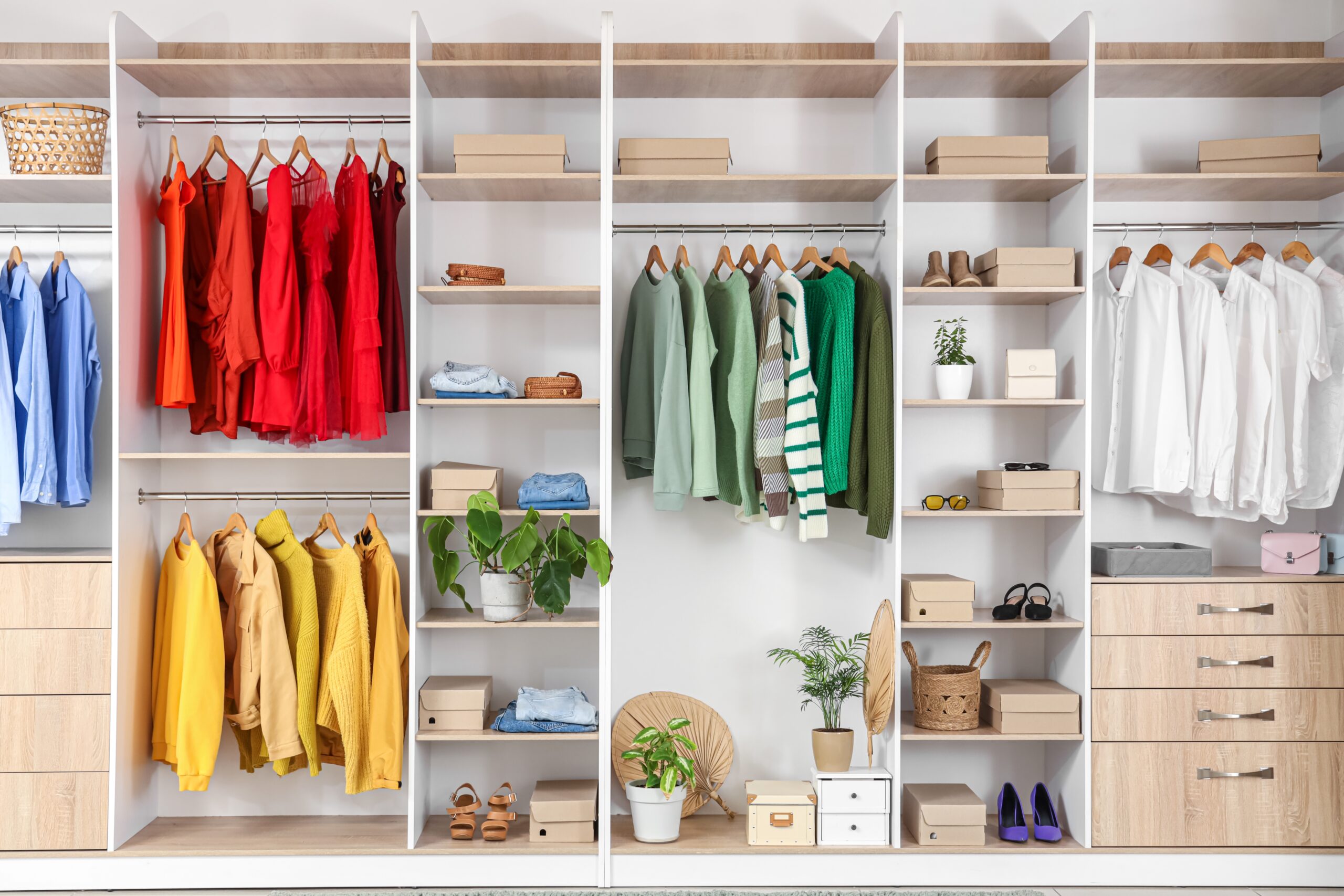 a closet with organizers and shelving