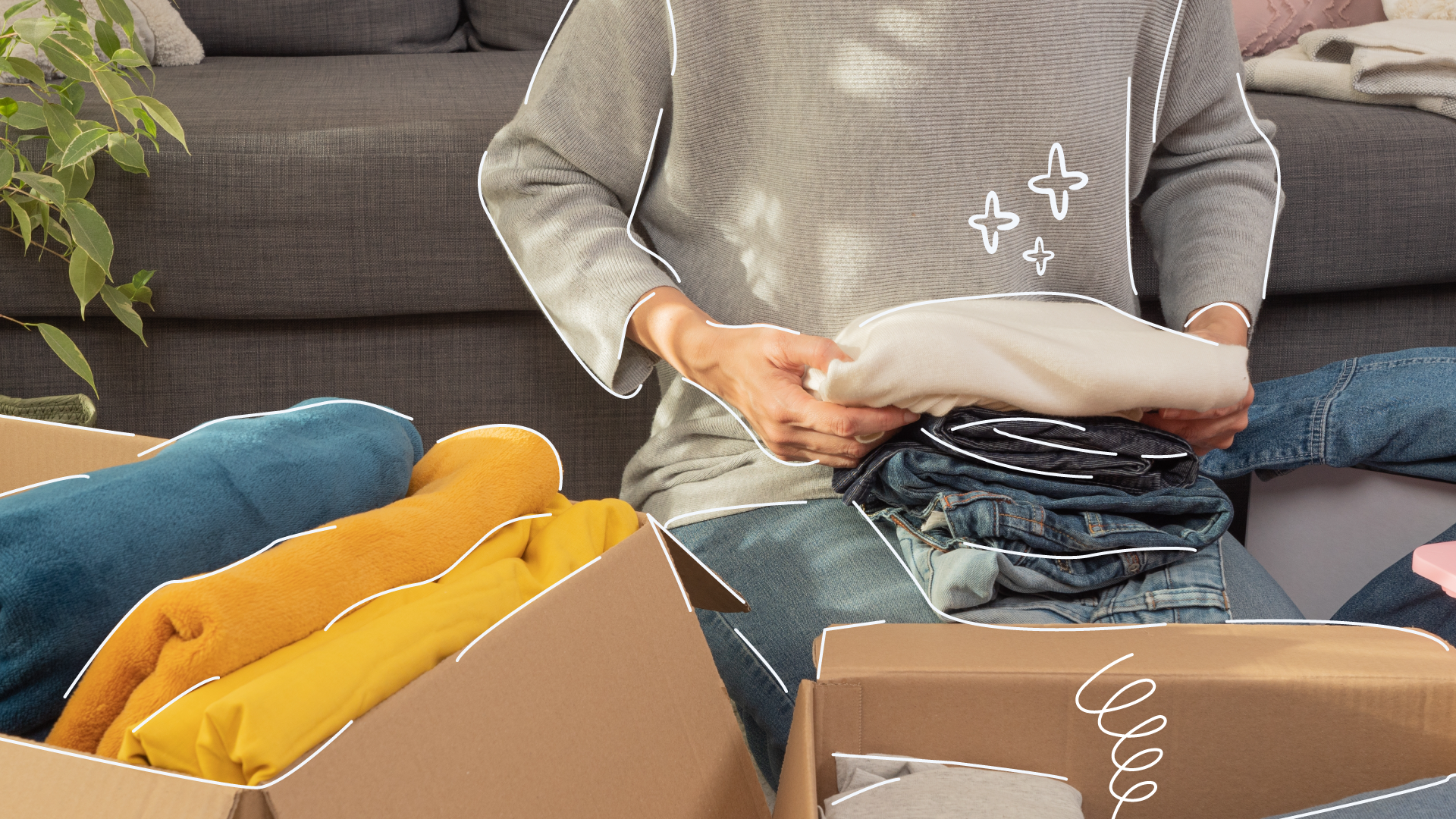 person decluttering clothes and sorting them into boxes